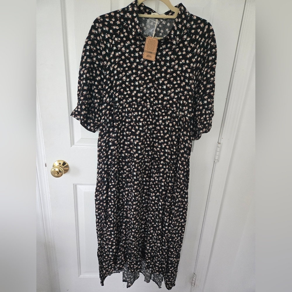 This is a Natural Life Rebecca Midi Dress in the large size and black with cream